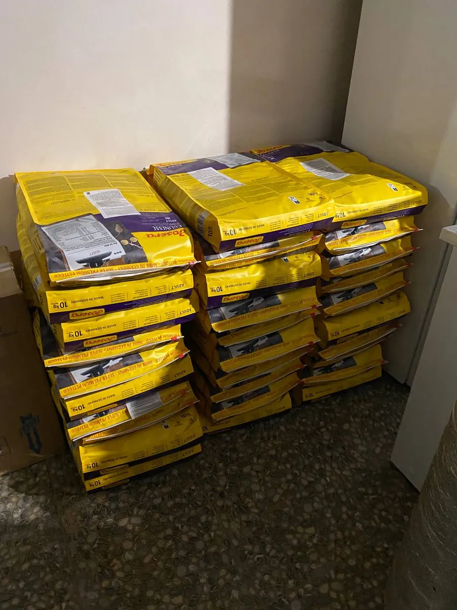 Stacks of dry cat food bags